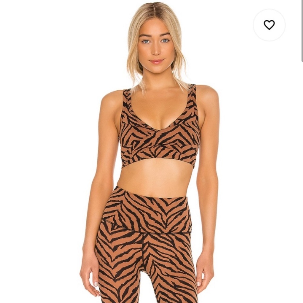 Like new Clay Zebra set. Kellam Medium sports bra and Century leggings, Small.